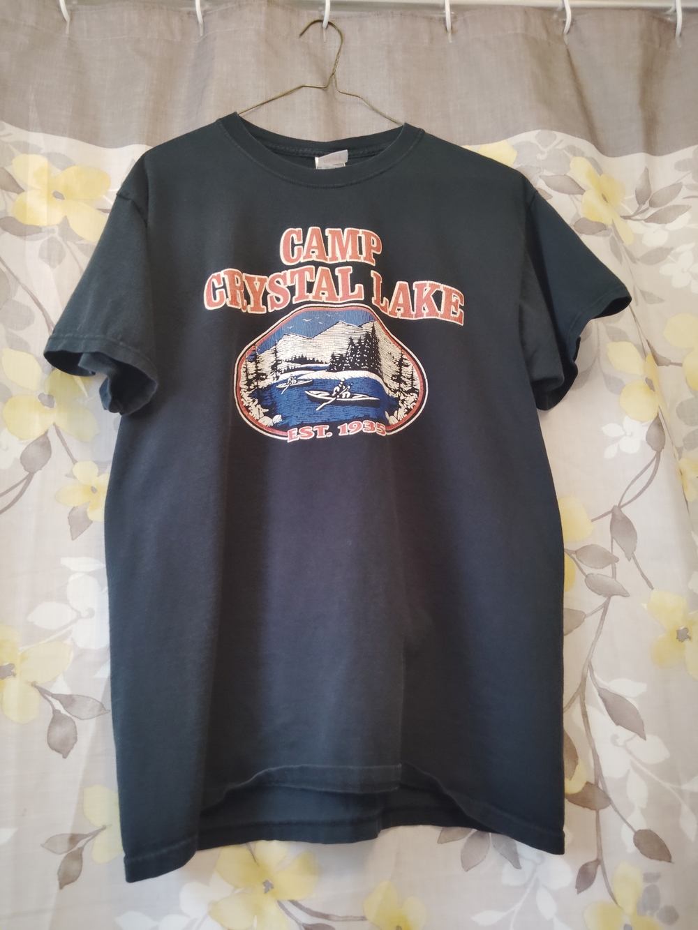 Camp Crystal Lake Counselor Black Tee with Orange and White Graphic